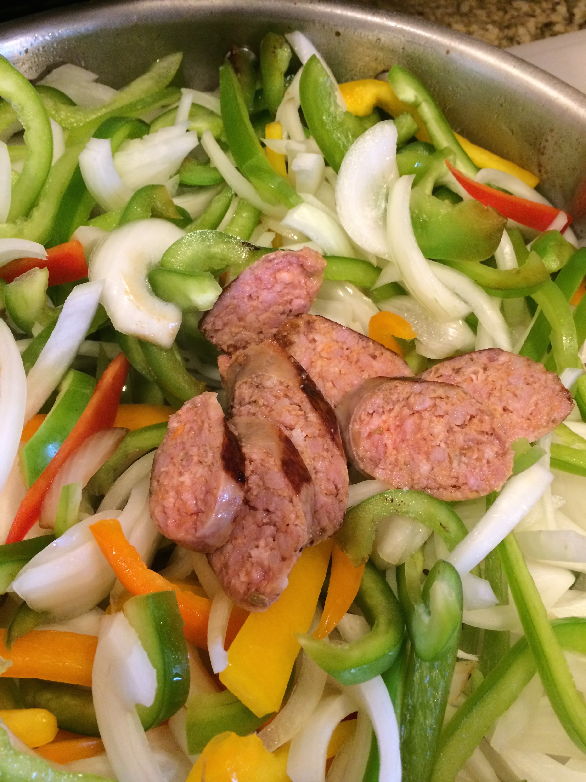 sausage with bell peppers and onions, confit